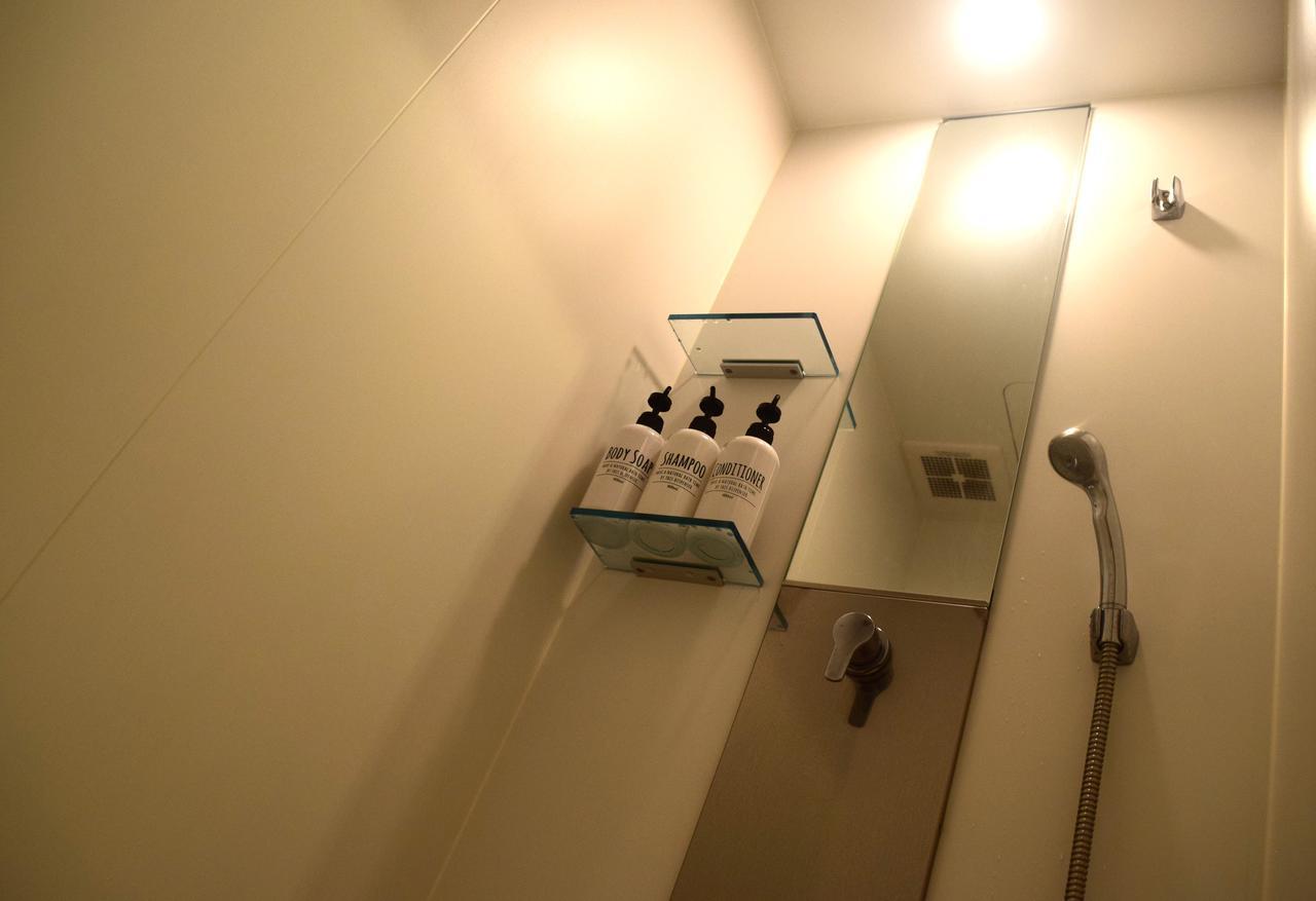 Guest House Golden Mile Hostel Amami Esterno foto