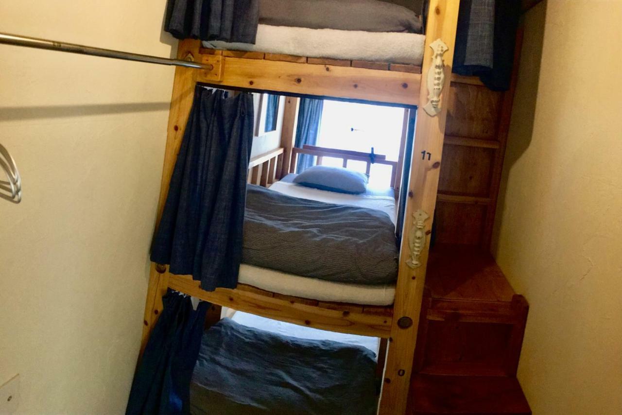 Guest House Golden Mile Hostel Amami Esterno foto