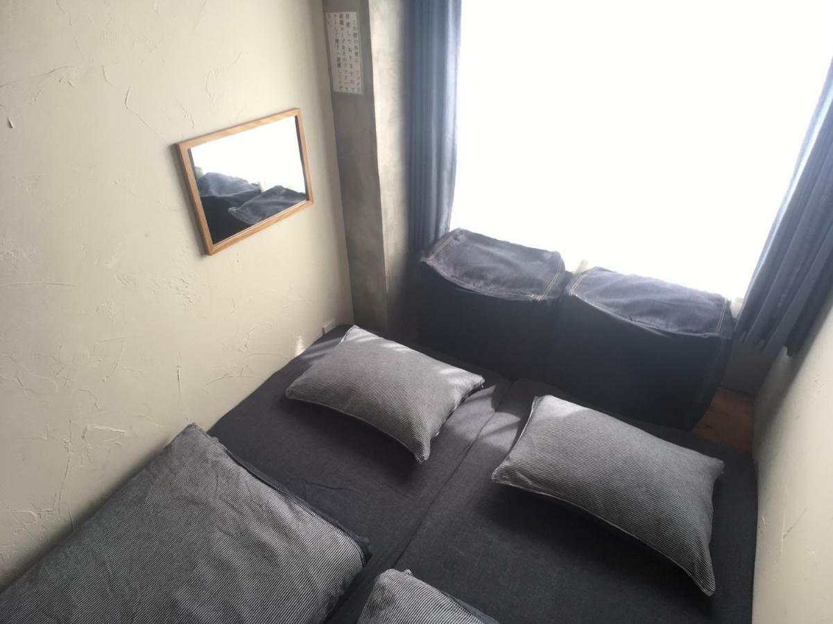 Guest House Golden Mile Hostel Amami Esterno foto