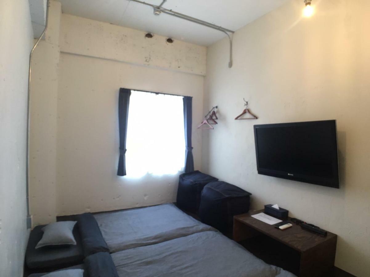Guest House Golden Mile Hostel Amami Esterno foto