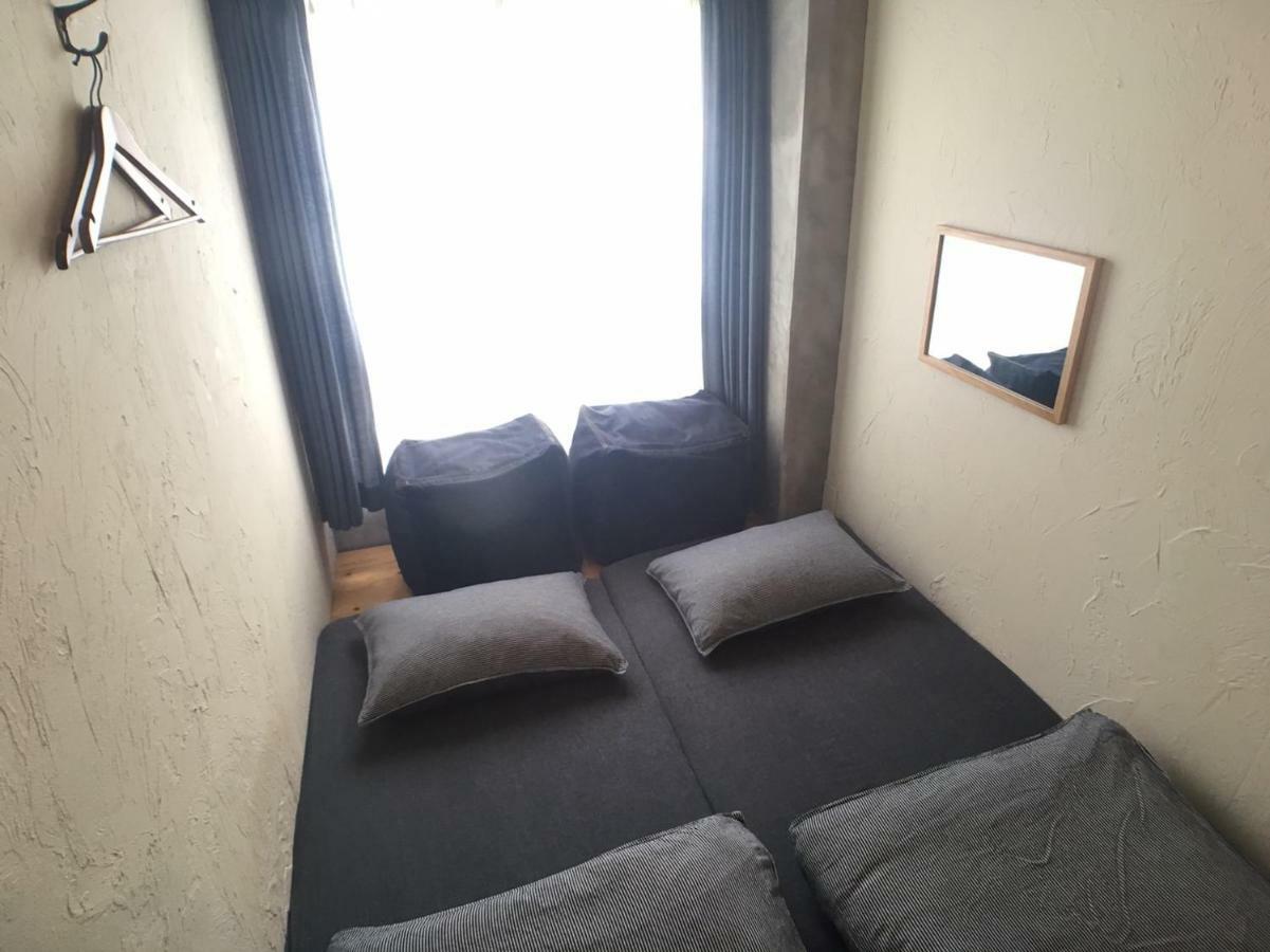 Guest House Golden Mile Hostel Amami Esterno foto